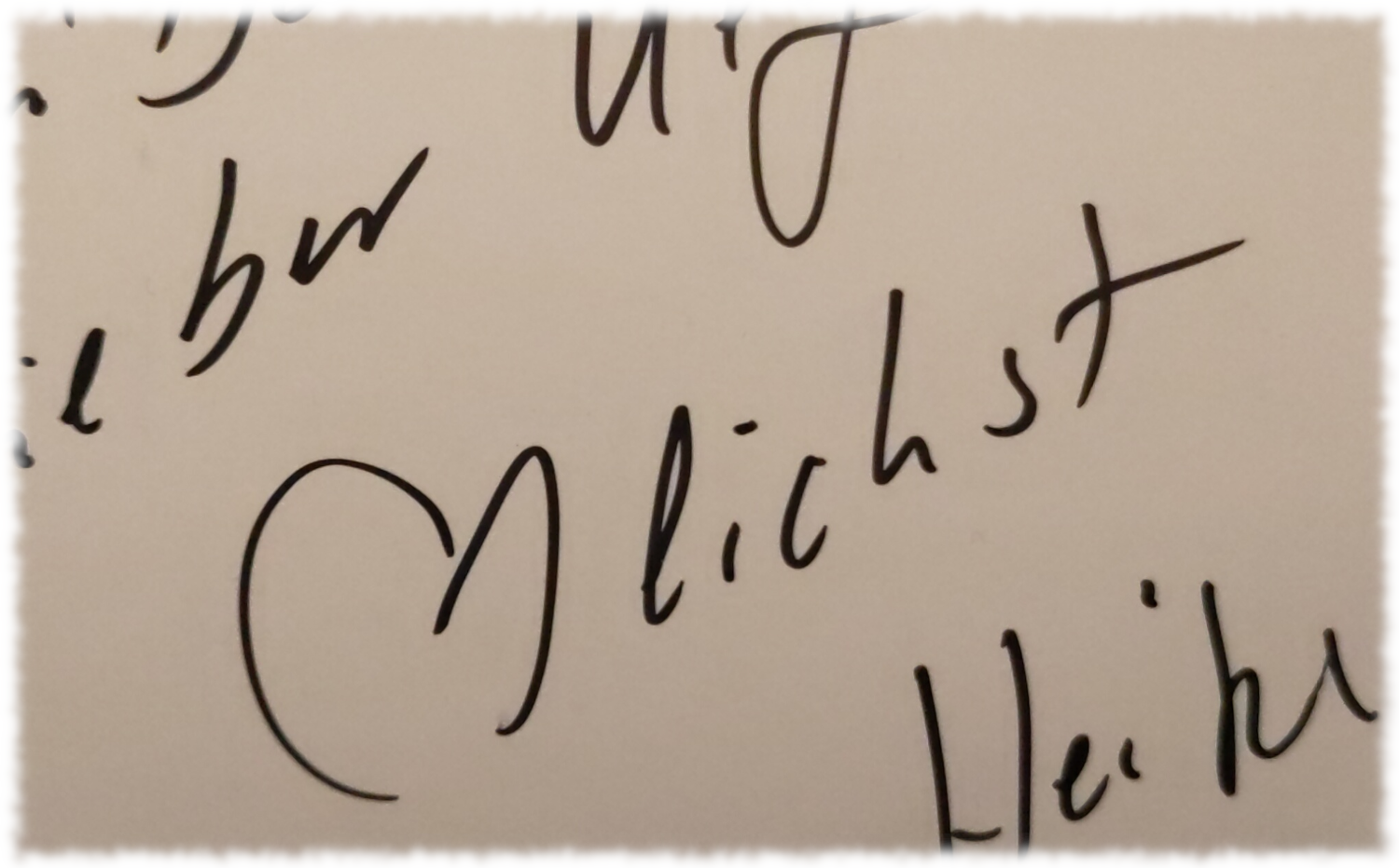 Ausschnit von einer Karte an mich mit der Signatur Herzlichst Heike 